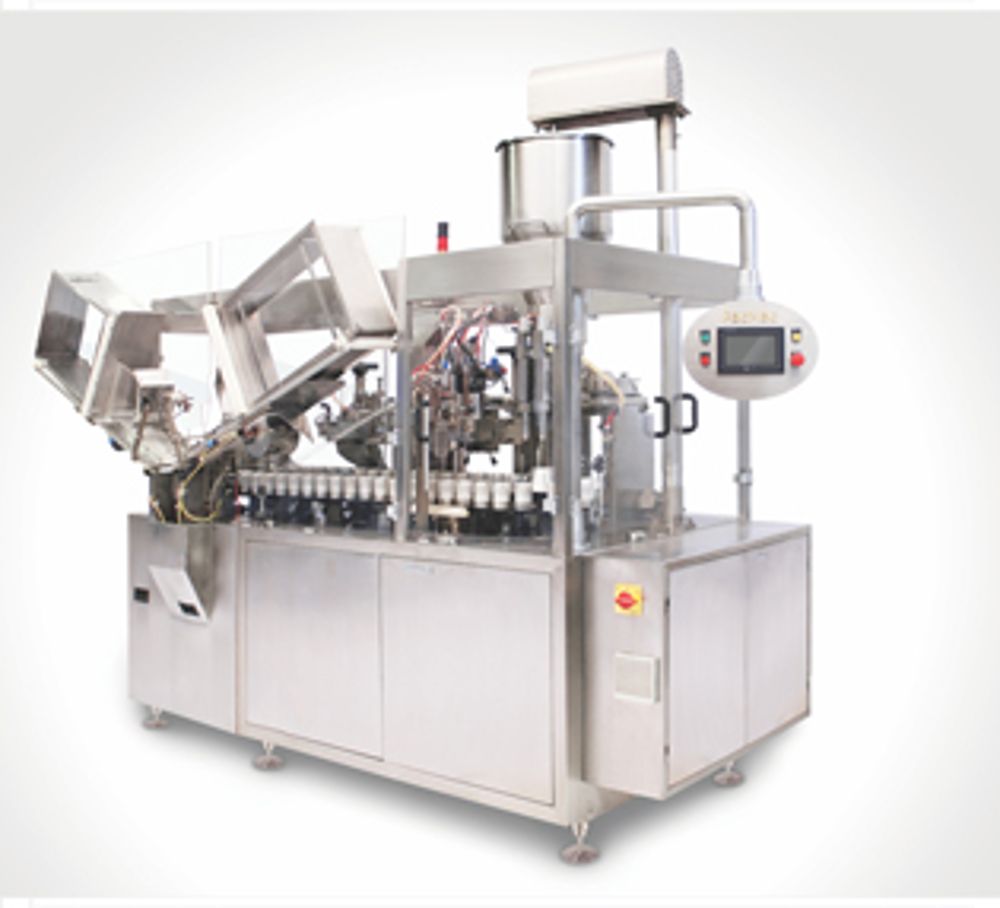 TUBE FILLING MACHINE